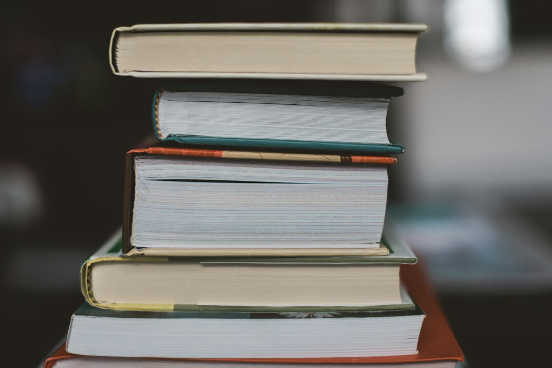 Close-up stack of old academic books and journals