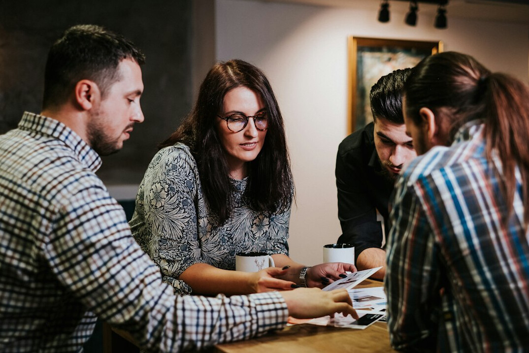 people discussing in meeting